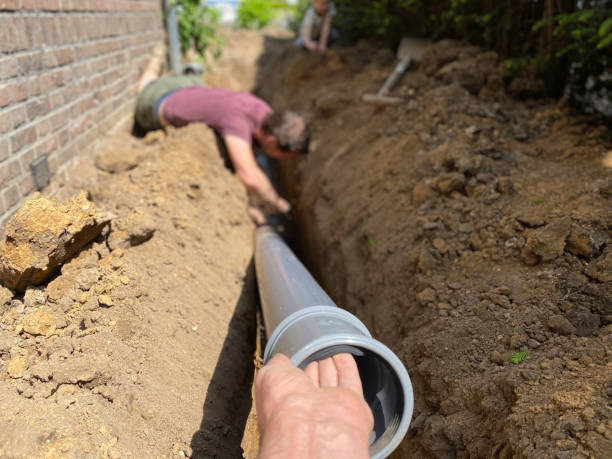 Professional drainage and grading work improving water flow on a Greensboro NC property